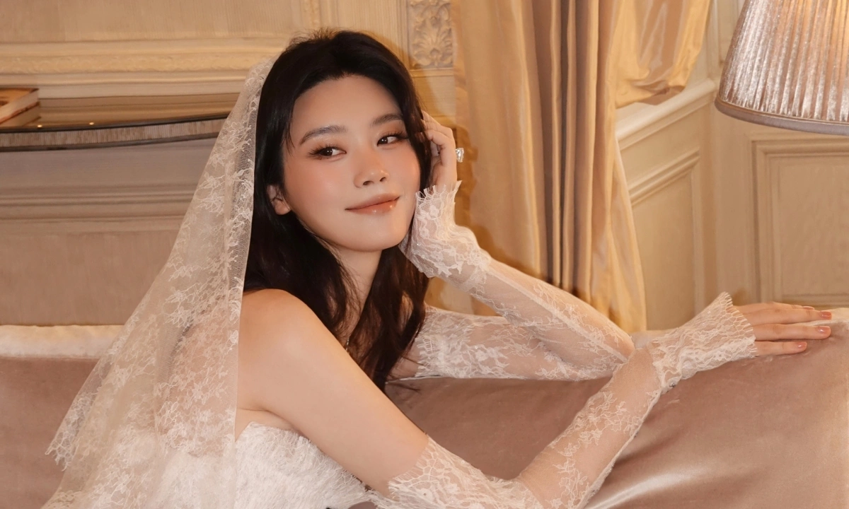 OKFUN Baccarat: Hề Mộng Dao rạng rỡ trong váy cưới nhà mốt Việt giữa tin đồn đại hôn - hình ảnh - okfun.vn